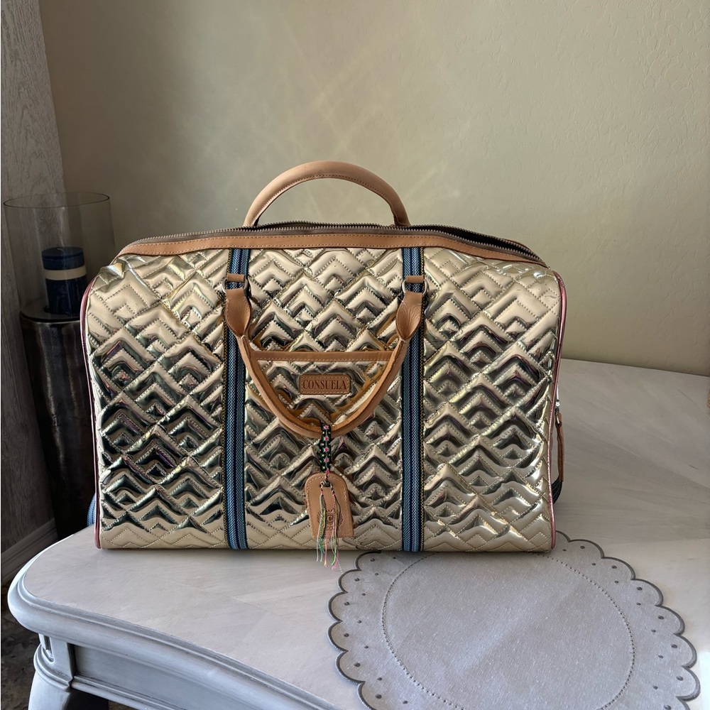 Consuela weekend bag used one weekend beautiful. I paid over $500.00